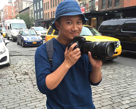 Canadian photographer Tommy Ton smiles for the camera.