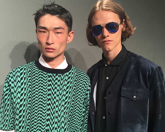Canadian model Ryan Keating (right) backstage at the Timo Weiland presentation.