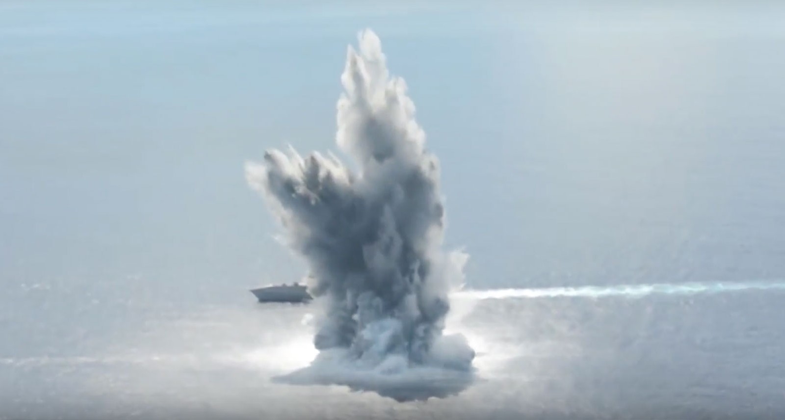 Watch a Navy Ship Pass a 10,000Pound Underwater Explosive Test Like It