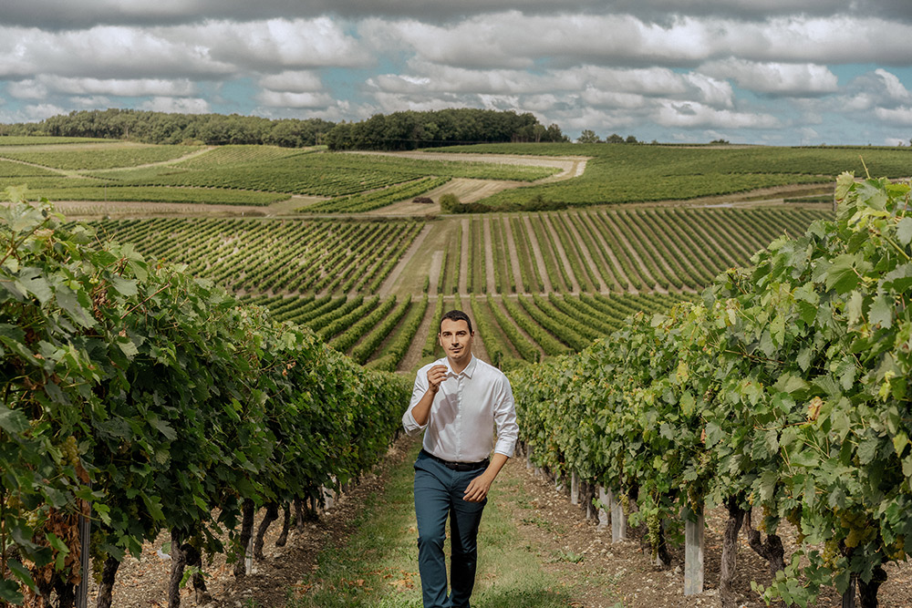 Cellar master Baptiste Loiseau among Grande Champagne's vineyards