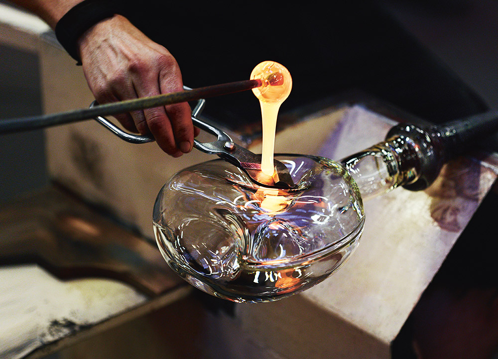 A crystal artisan crafts the iconic LOUIS XIII decanter