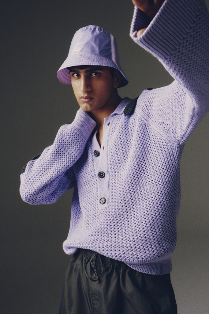 Man in purple knitwear