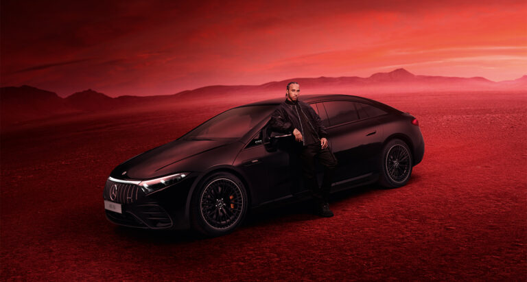 Mercedes AMG C64 side and front profile with deep red landscape background