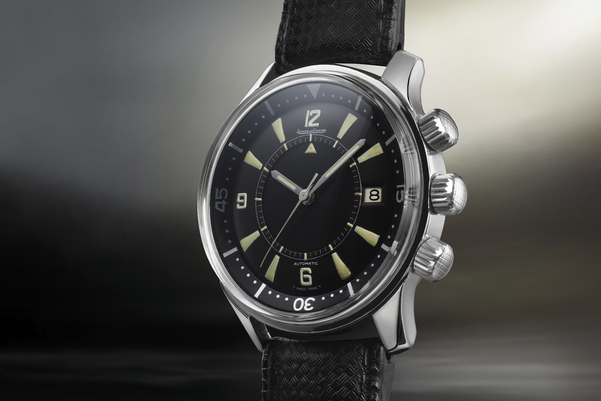 Jaeger-LeCoultre watch black dial and steel rim