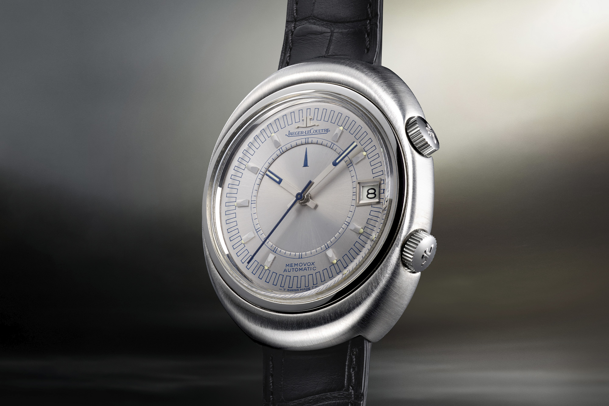 Jaeger-LeCoultre watch silver dial close up black band