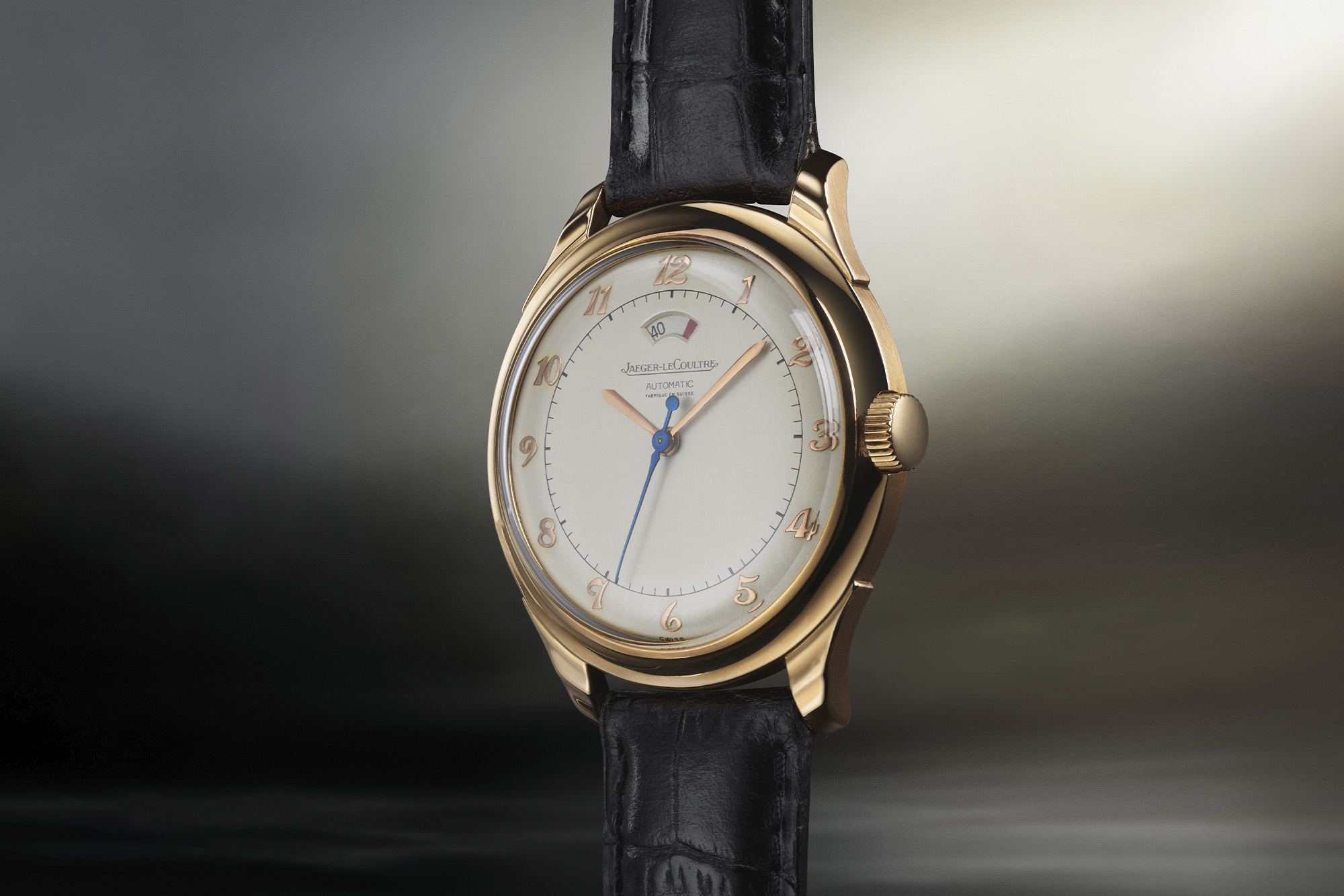 Jaeger-LeCoultre watch white dial close up with gold rim