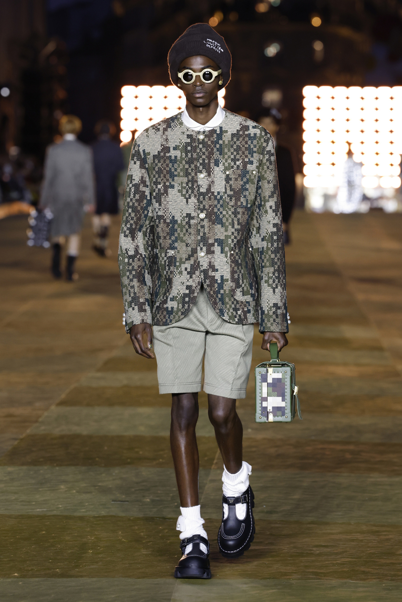 Pharrell Williams Louis Vuitton Men's Spring-Summer 2024 model in camp blazer and shorts