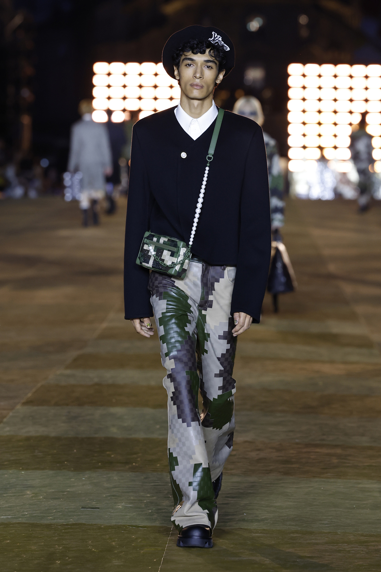Pharrell Williams Louis Vuitton Men's Spring-Summer 2024 model in black top camp pixel pants