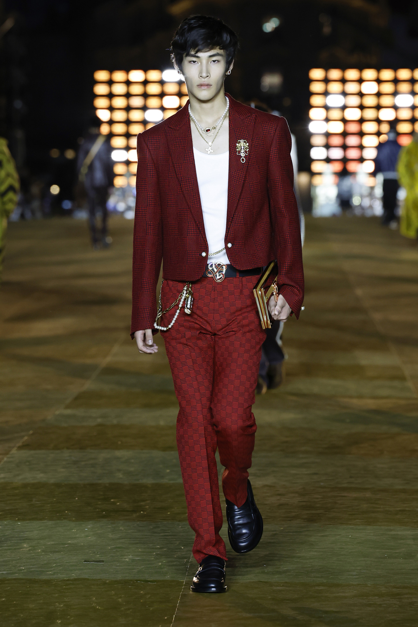 Pharrell Williams Louis Vuitton Men's Spring-Summer 2024 model in red suit