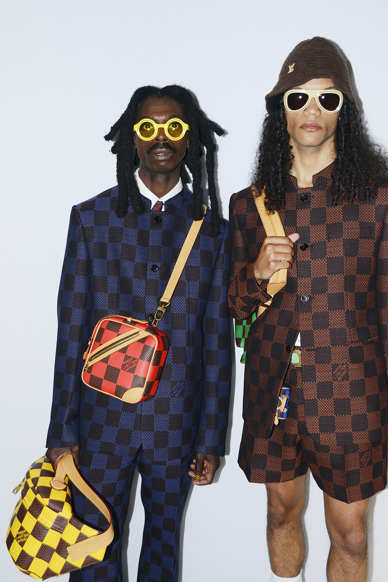 Pharrell Williams Louis Vuitton Men's Spring-Summer 2024 two models in checkers and sunglasses