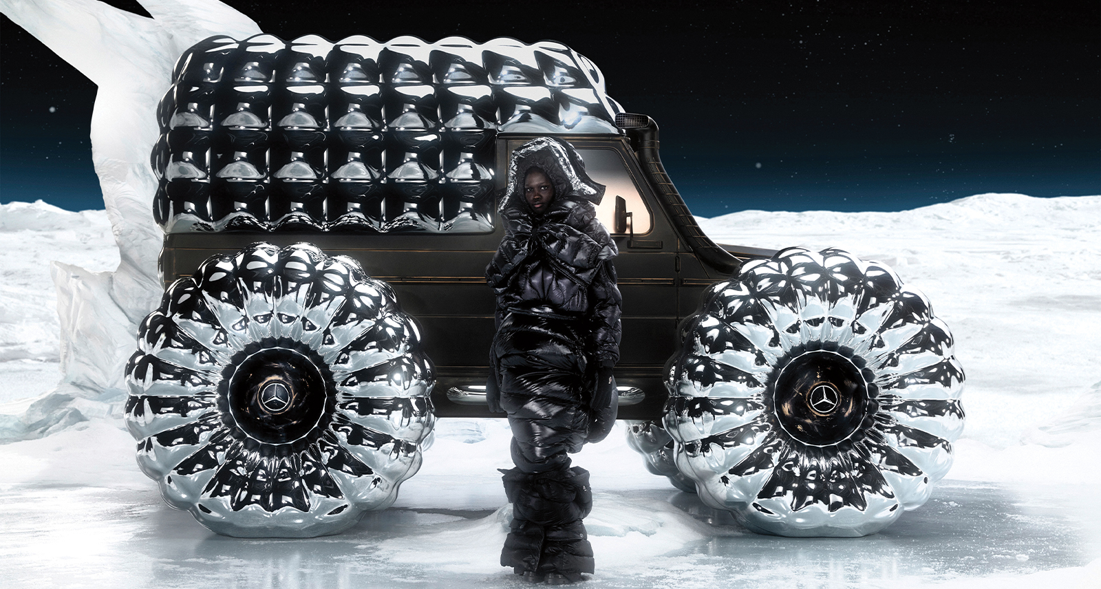 Mercedes-Benz X Moncler Mondo G featured car on snow and black sky background with model in front