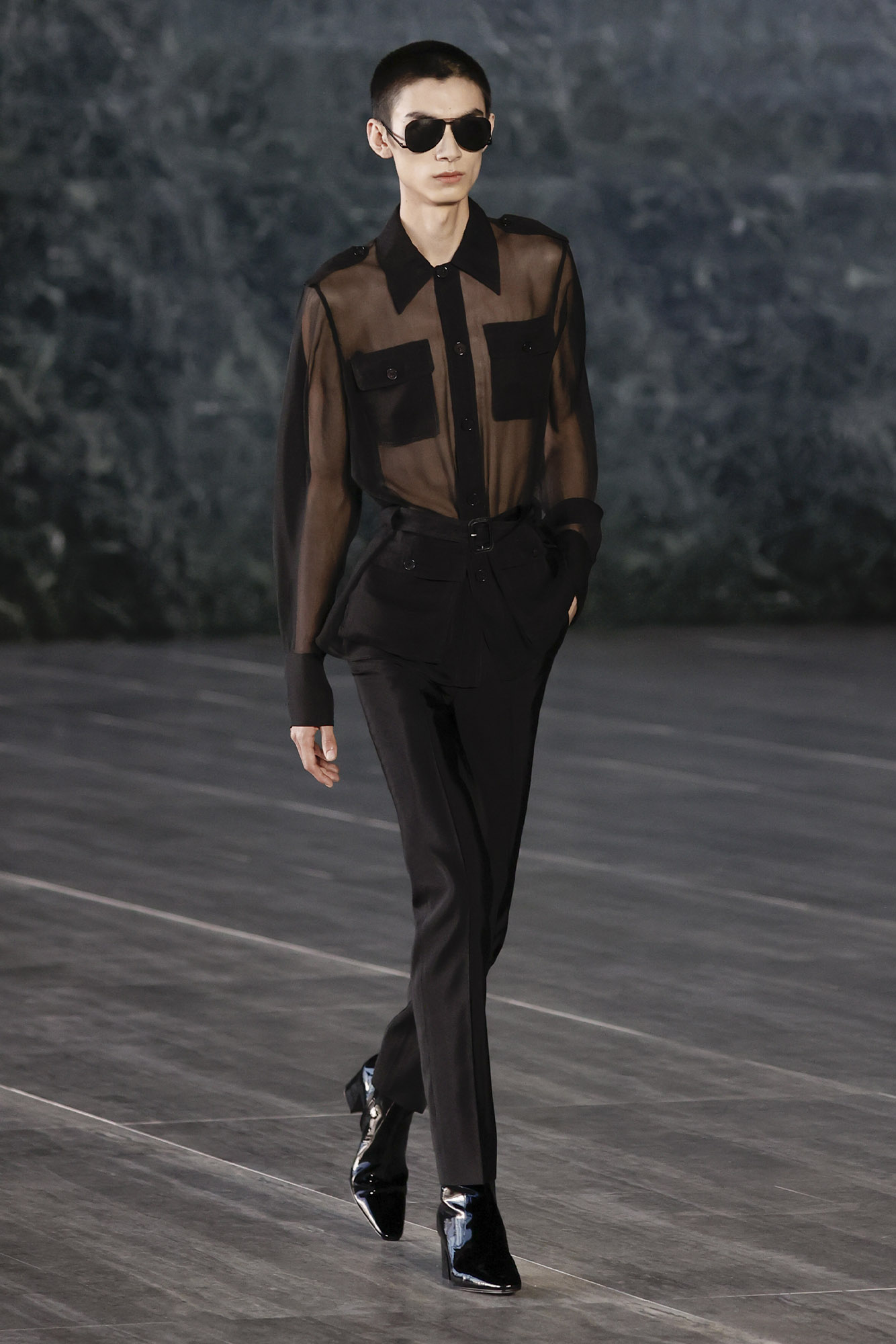 Saint Laurent Spring/Summer 2024 male model in sheer button down shirt on runway