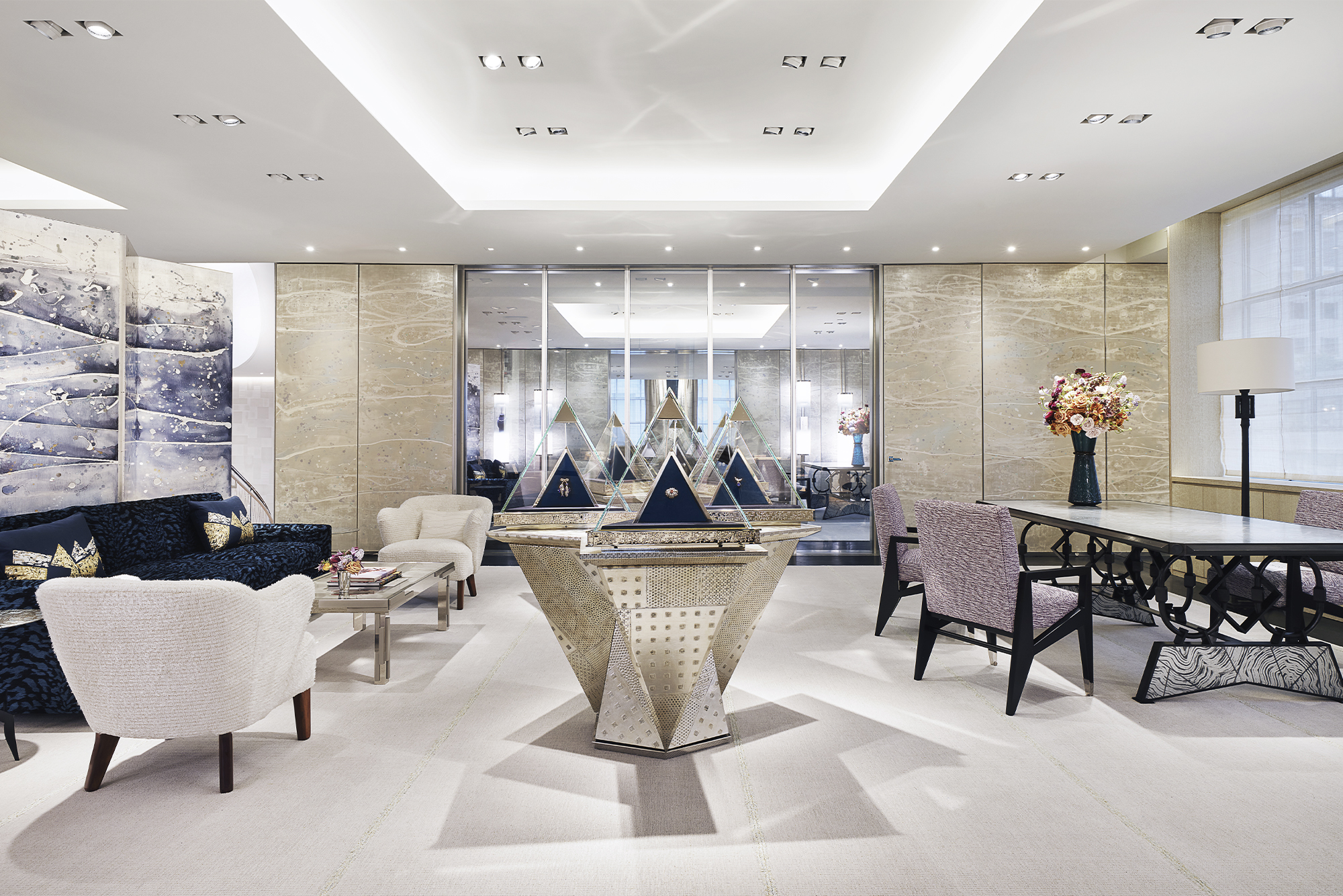 Tiffany & Co. The Landmark interior with white tile floor and white-lit ceilings and table