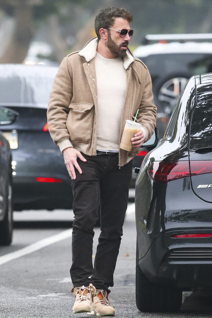 Ben Affleck celebrity streetwear brown jacket black pants stepping out of car
