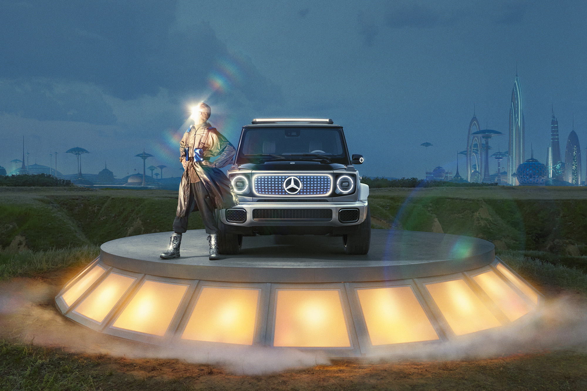 Mercedes-Benz EQG front view on elevated circular platform with ground lighting