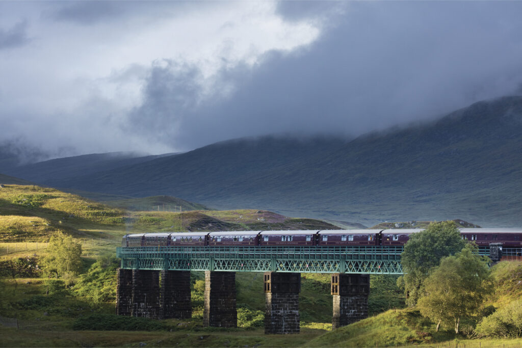 Royal Scotsman travelling across bridge