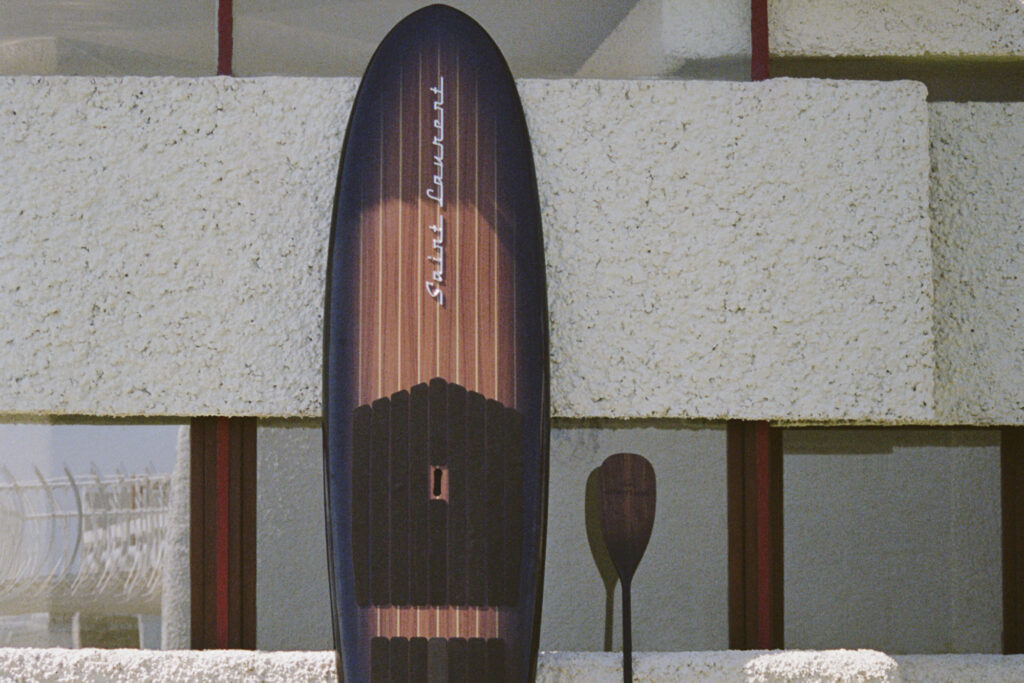 Saint Laurent Rive Droite surfboard and paddle