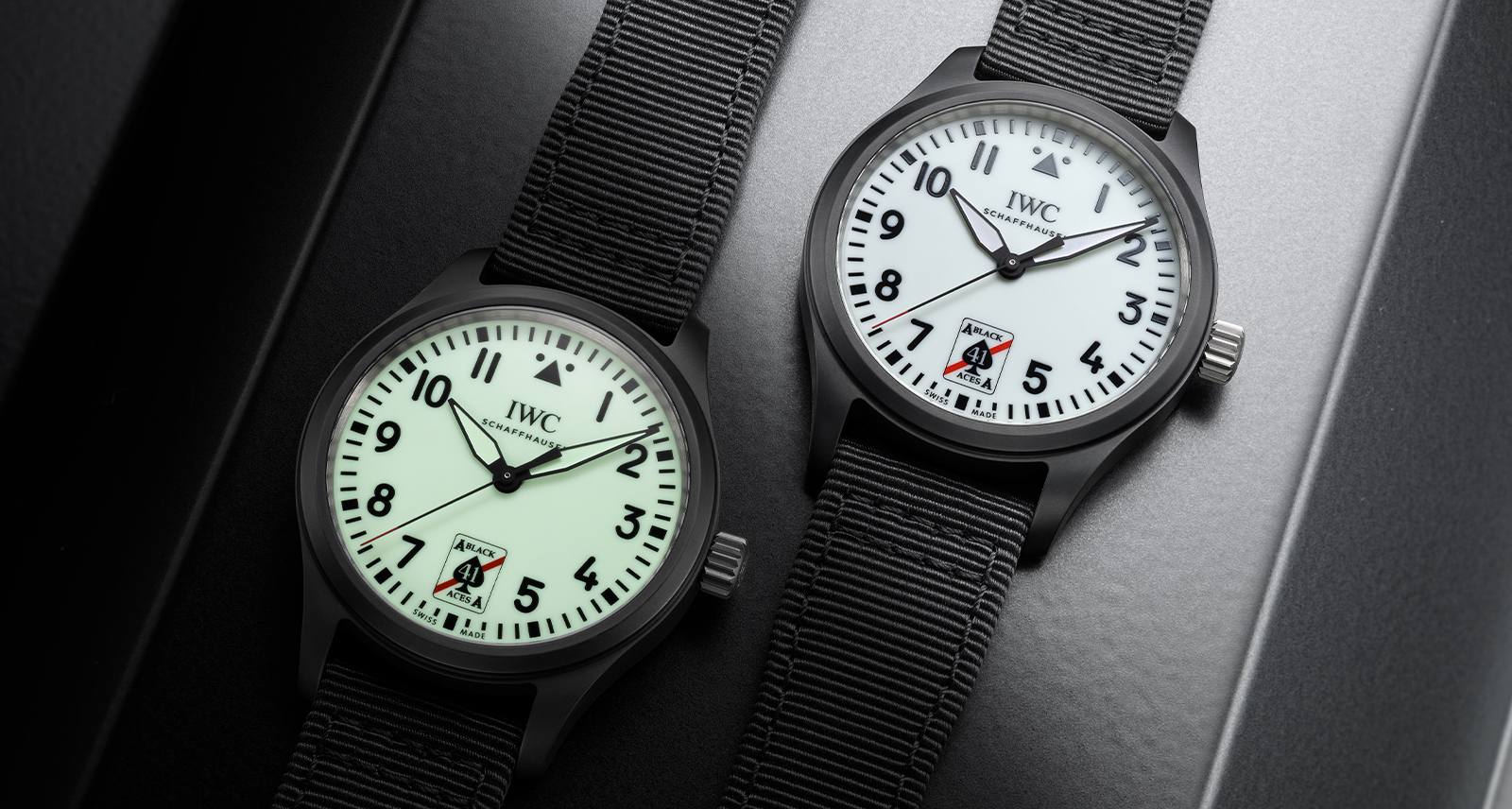IWC Pilot’s Watch Automatic 41 Black Aces; pack shot of two watches laying spread out