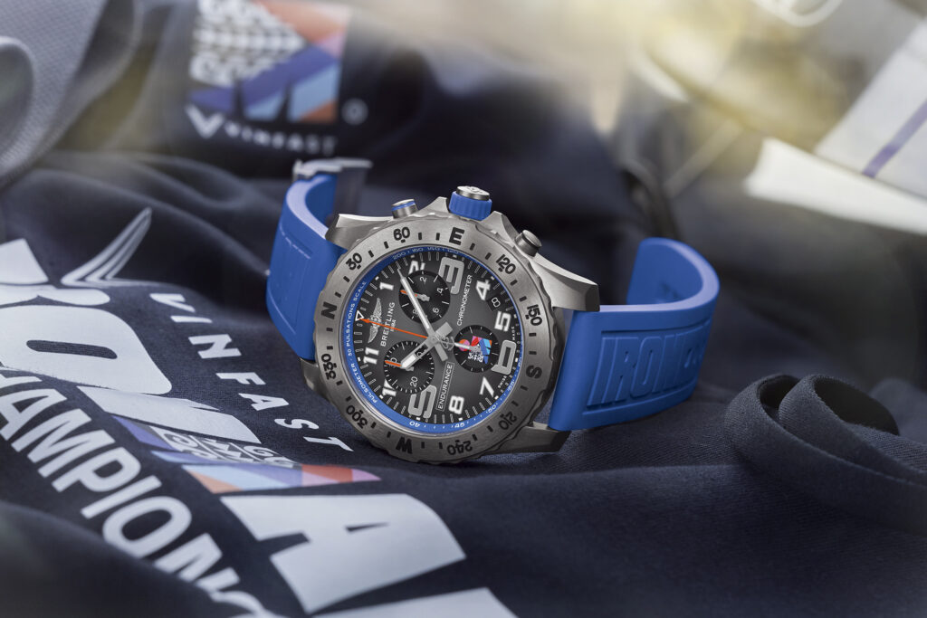 Limited Edition Breitling Endurance Pro for Ironman in blue on Ironman table with dial facing camera