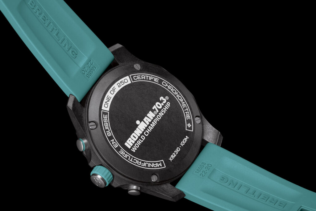 Limited Edition Breitling Endurance Pro for Ironman in turquoise on black background shot from the back to show reverse side of watch