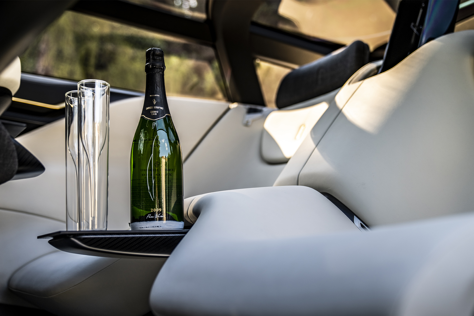 Automobili Pininfarina Pura Vision EV Concept champagne on armrest
