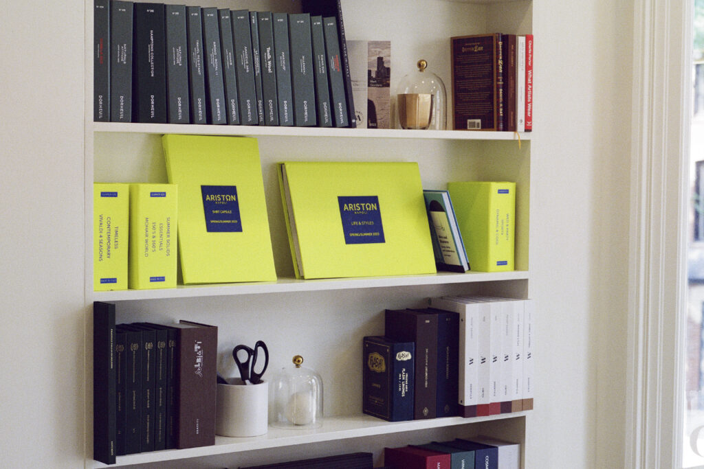 Shelves stocked with books at Atelier Munro