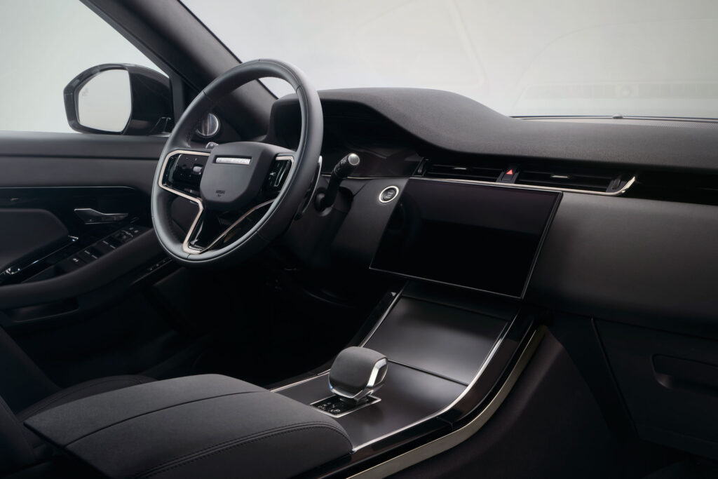 Interior shot of a Range Rover Evoke shows steering wheel