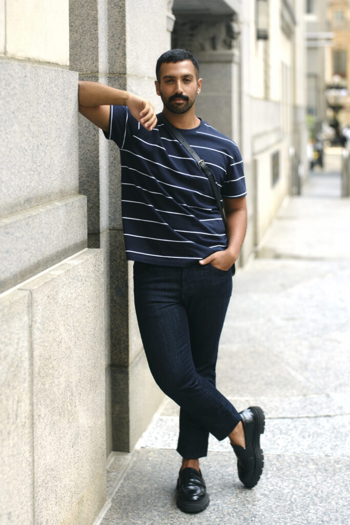 Joe fresh model in striped tee and dark wash pants