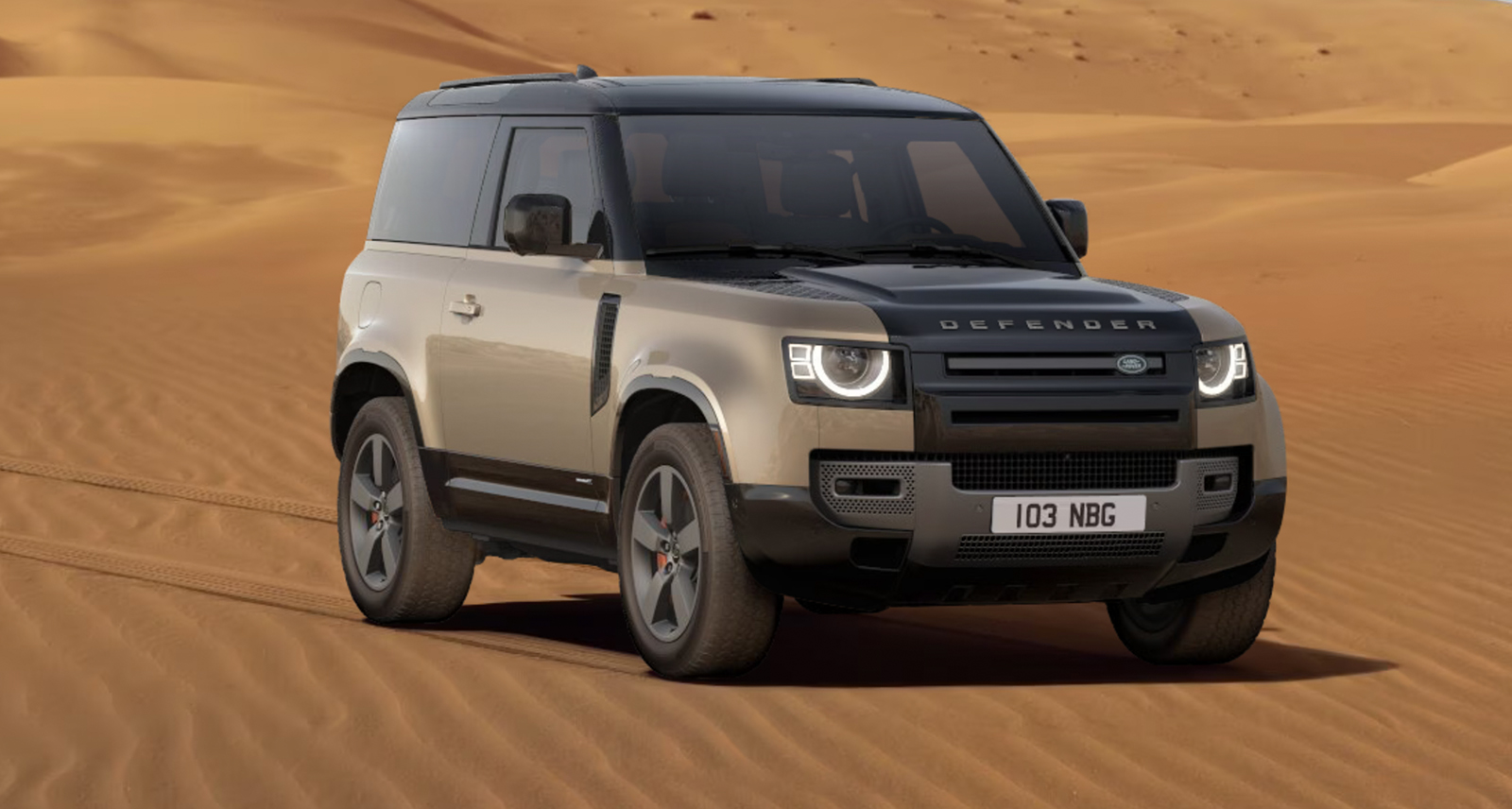SHARP built Land Rover Defender parked in a desert shot from the front right corner