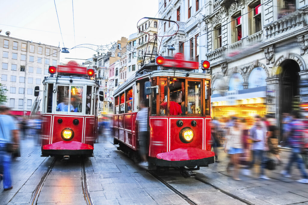 Red cable cars zip down the streets of Istanbul