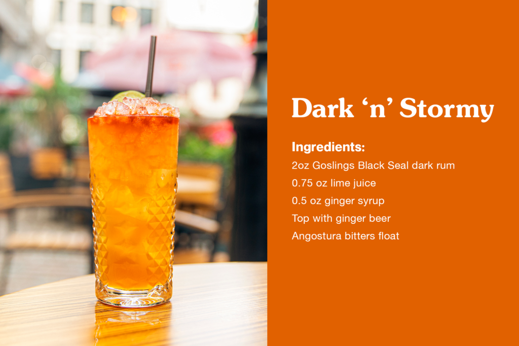Recipe card: on the left is a Dark n stormy cocktail served on a patio. the right shows the recipe on an orange background