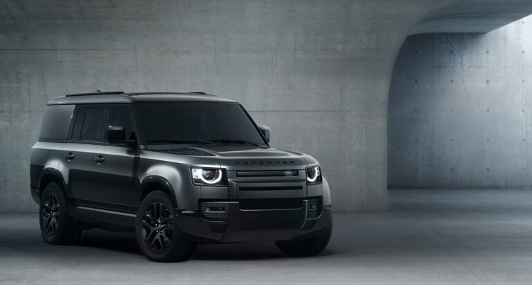 Land Rover Defender parked in concrete setting