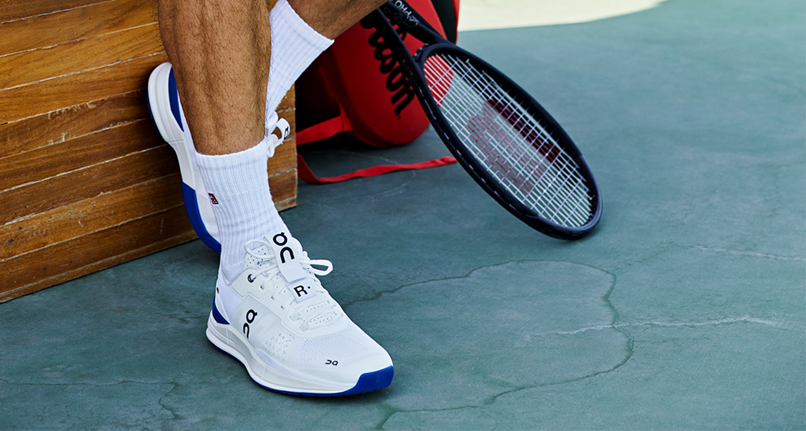 Roger Federer wearing ON Running Tennis shoe on court
