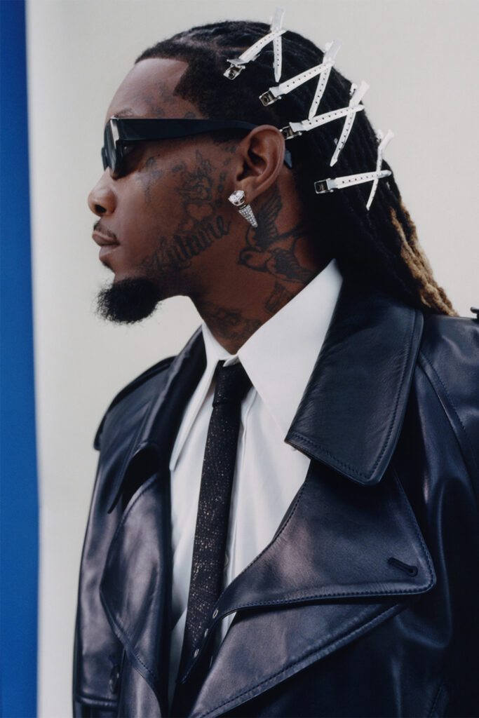 Offset interview on off the wall for Sharp November; rapper in sunglasses, leather jacket, white shirt and tie