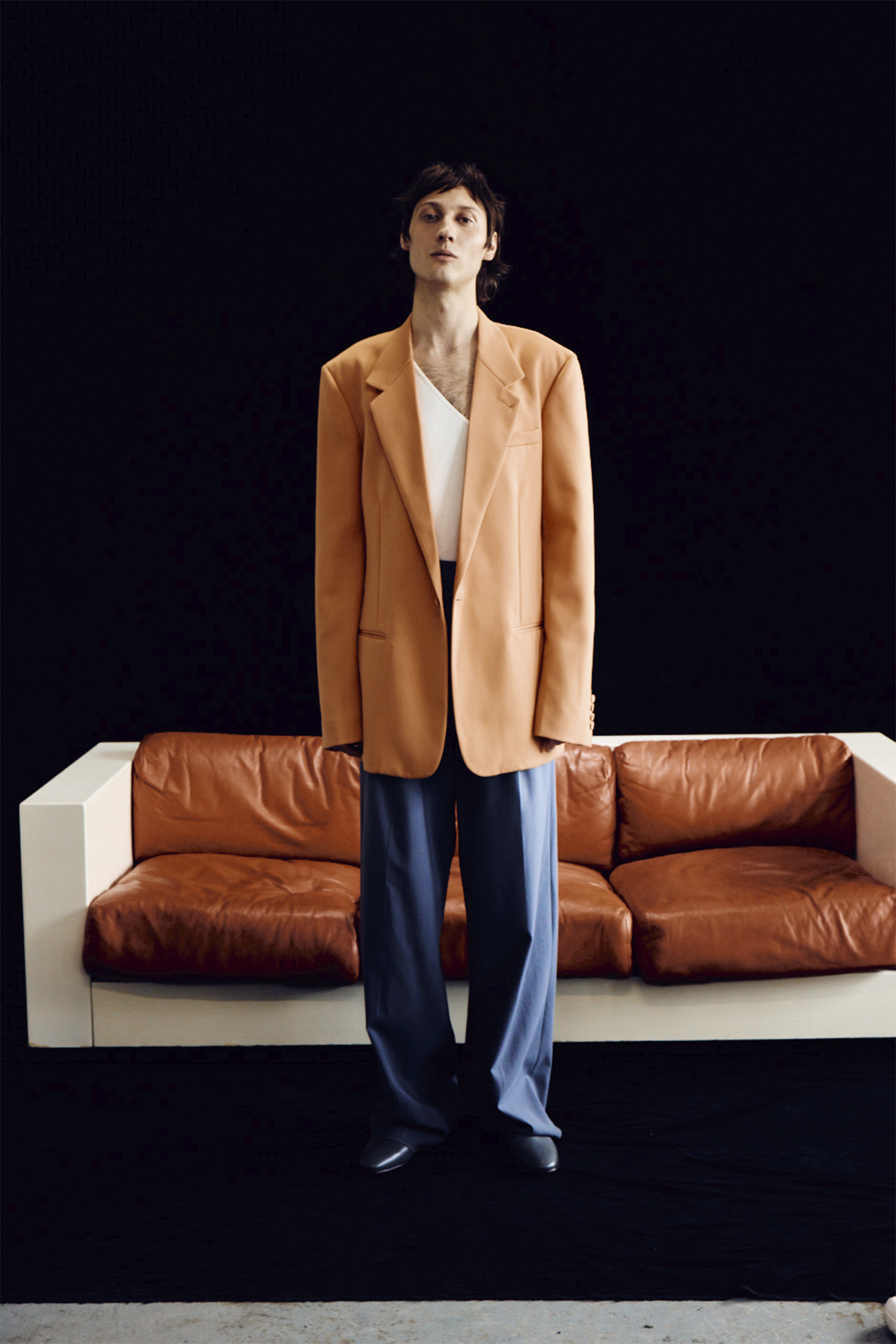 Model for Sharp November in orange blazer men's fashion