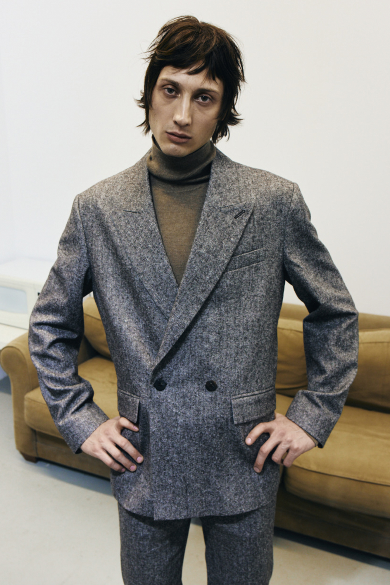 Model for Sharp November in grey double breasted suit