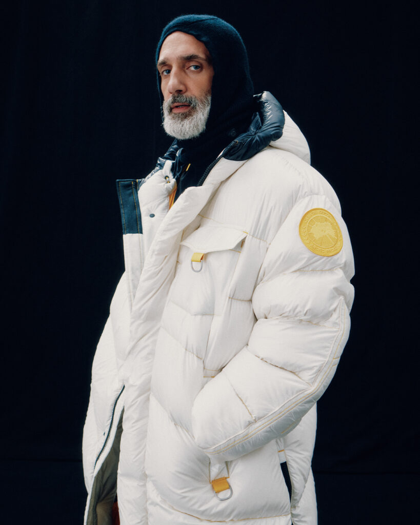 Book for Men Fall Winter fashion photoshoot man in white winter jacket