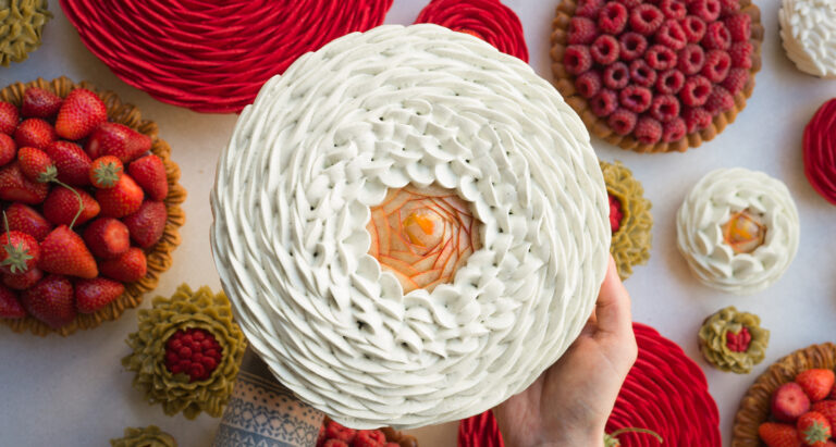 close up of white cake by Cedric Grolet