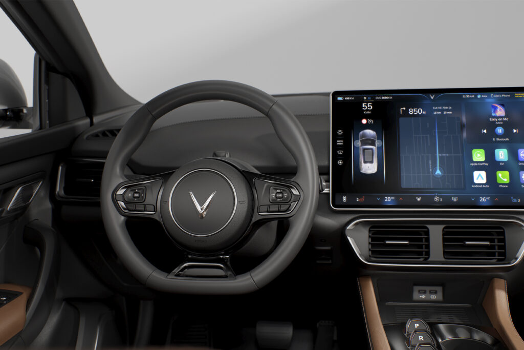 steering wheel of a vinfast car with touchscreen dashboard
