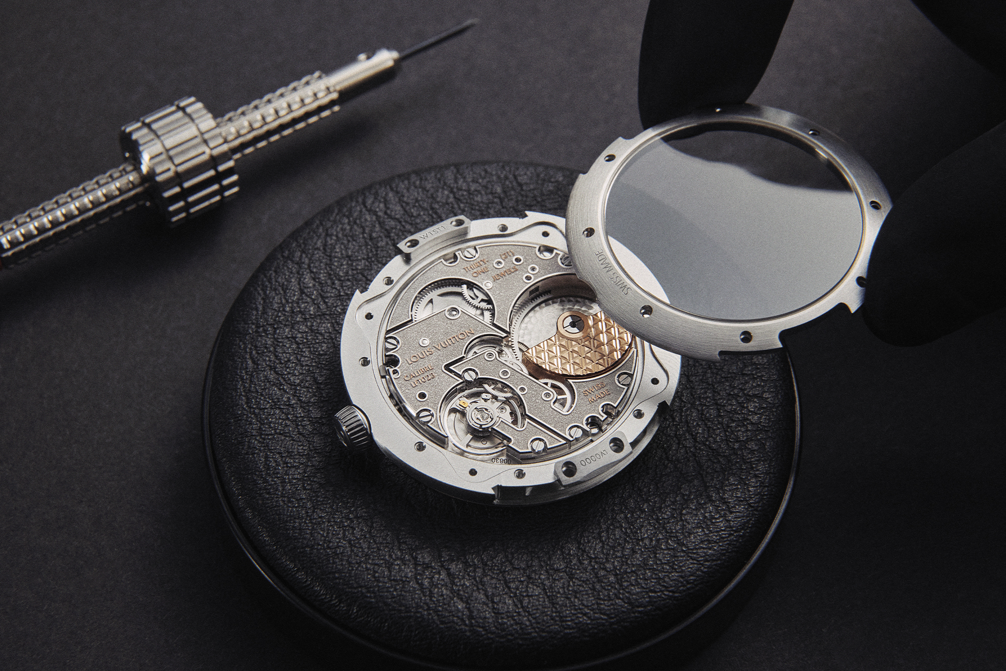 Louis Vuitton Tambour putting the glass on the back of the dial