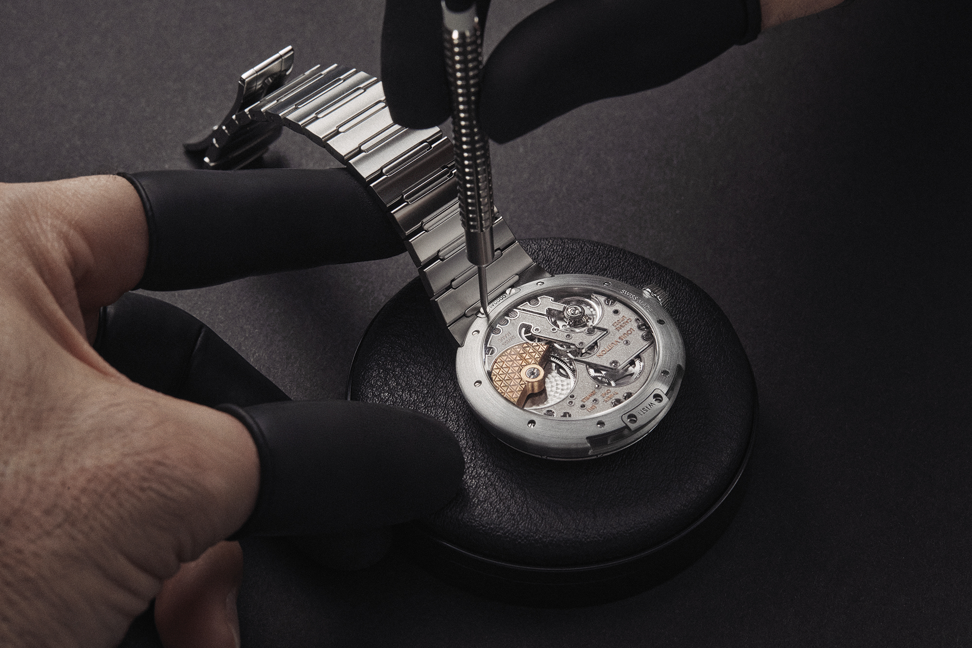 Louis Vuitton Tambour steel bracelet silver dial in progress person working on the back of dial