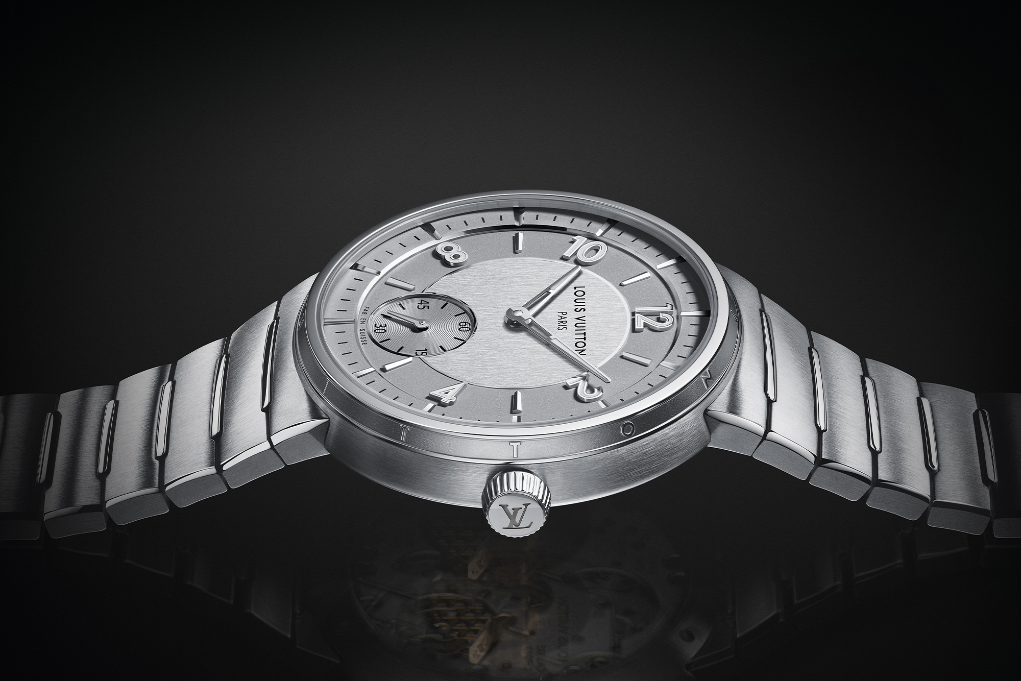 Louis Vuitton Tambour steel bracelet silver dial laid out from side