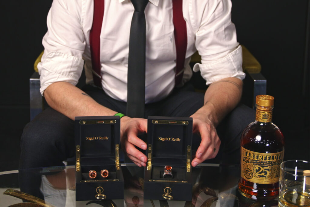 Nigel O'Reilly with the collection of Aberfeldy whisky