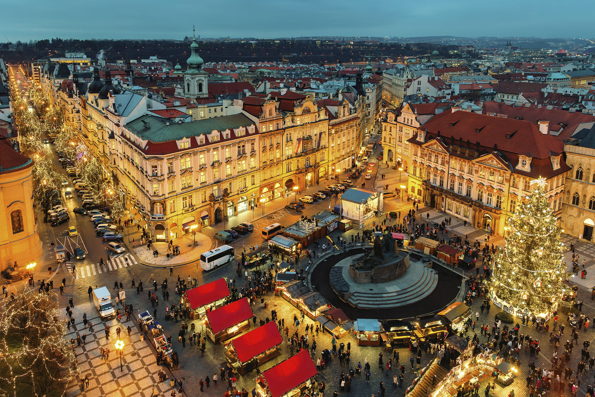 Christmas Market in Prague, Czech Republic at night - book a trip with flighthub cheap flights