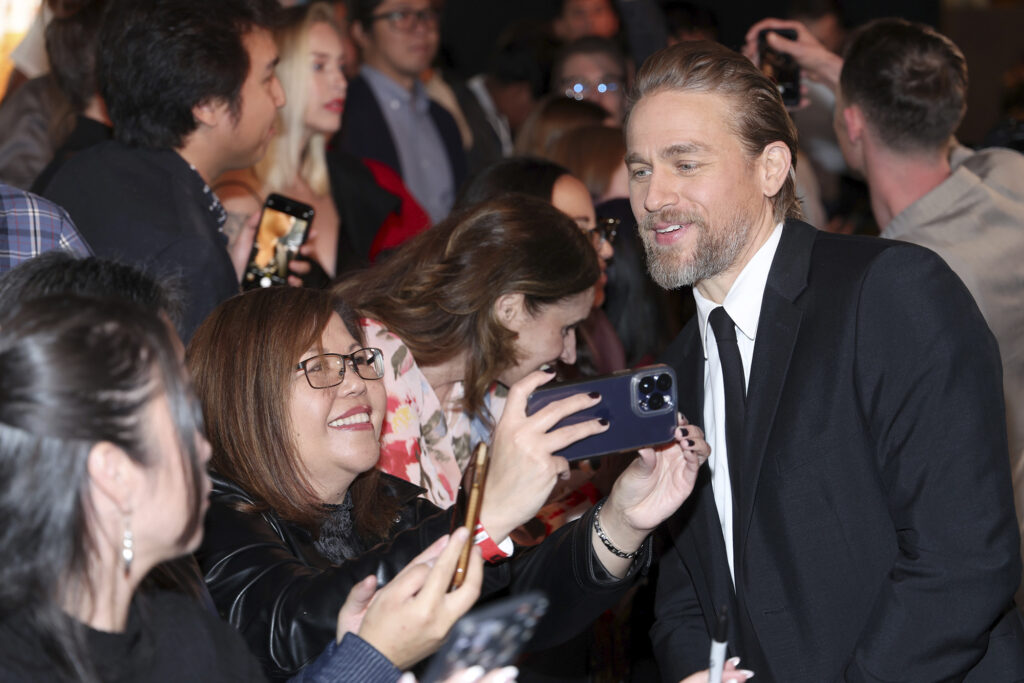 Charlie Hunnam greets fans