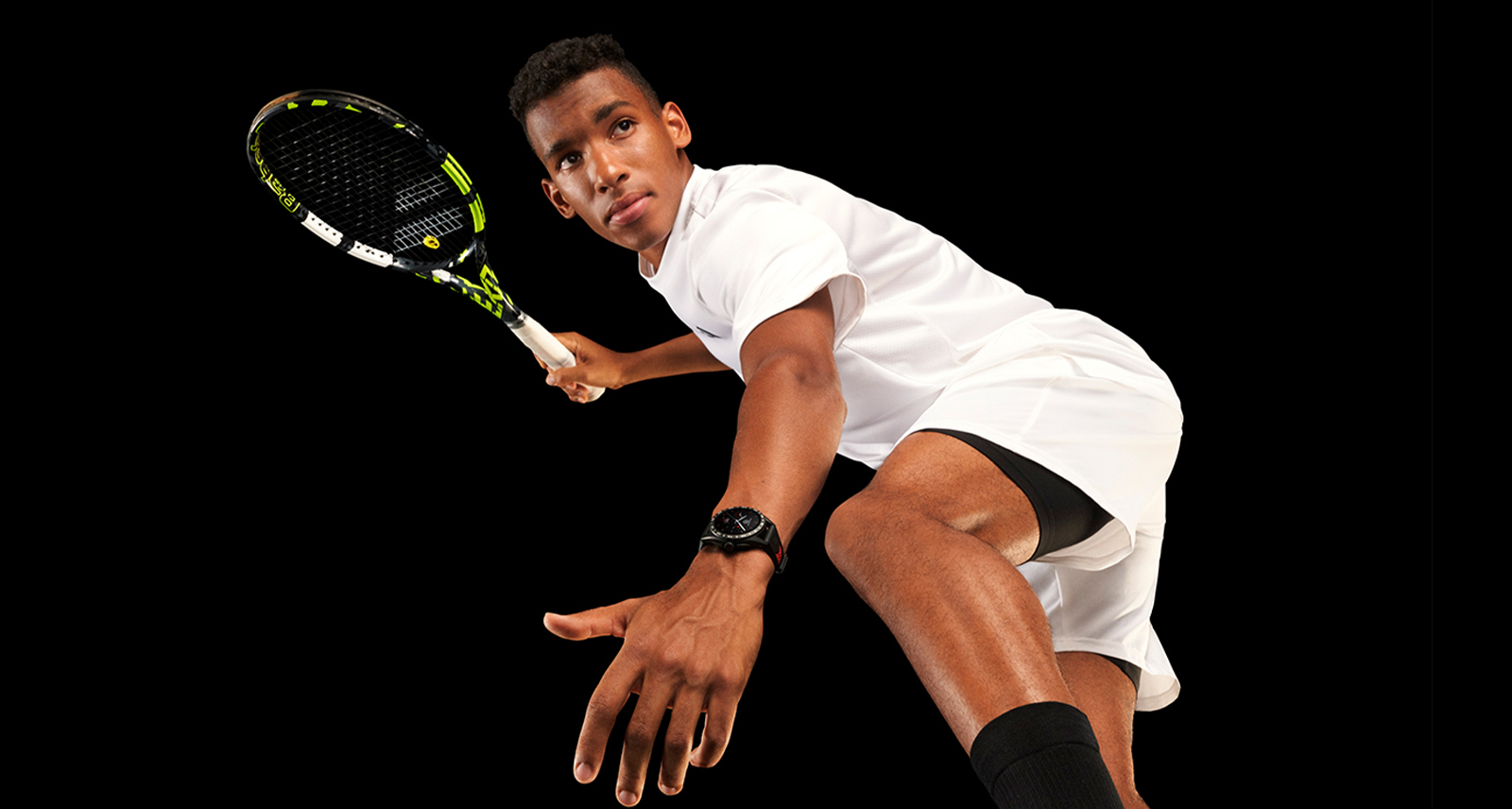 Felix Auger-Aliassime with a tennis racket