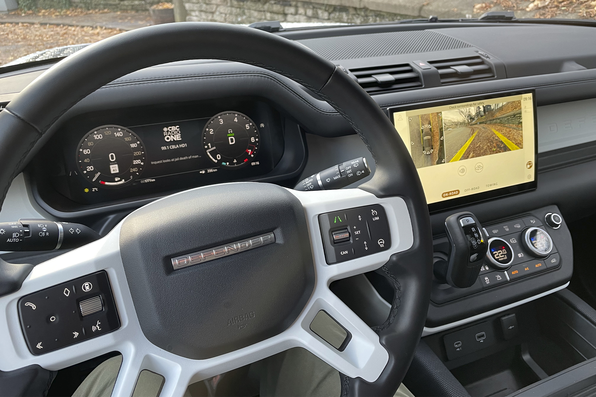 SHARP drives 2024 Defender; white model steering wheel