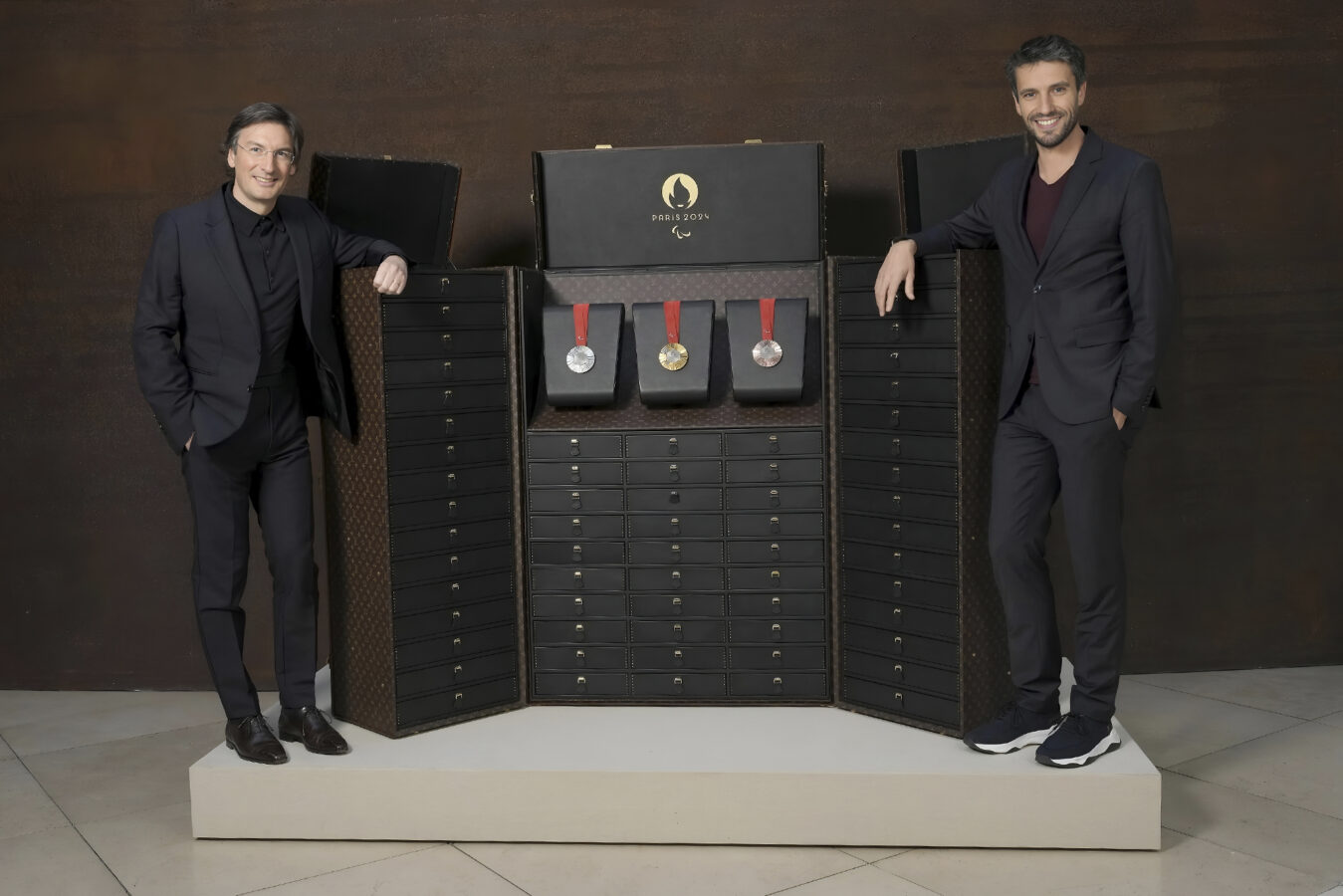 2024 Paris Olympics: Louis Vuitton Designs Torch & Medal Trunks - Sharp ...