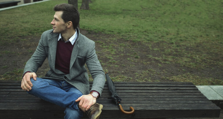 man in a blazer and jeans