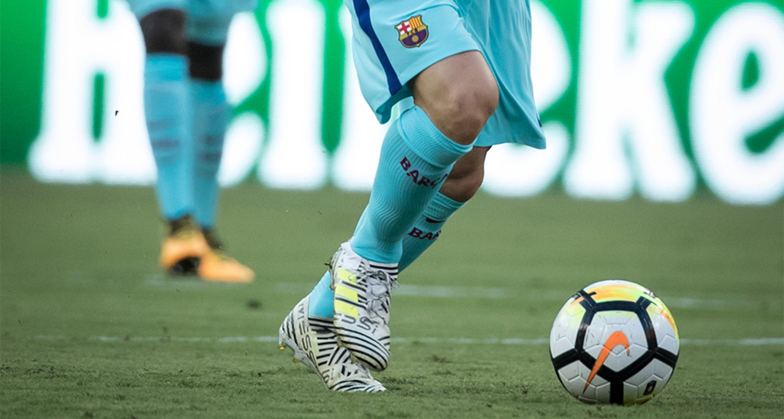 Messi crop of soccer ball and field